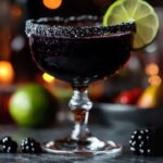 The Black Magic Margarita is a spellbinding twist on the classic margarita that’s sure to enchant your taste buds. This cocktail features a mysterious black hue from black vodka, creating a striking visual that’s perfect for Halloween or any festive gathering. The combination of tangy lime juice, sweet agave nectar, and the bold flavor of black vodka makes this drink both refreshing and intriguing. Get ready to impress your guests with this magical concoction!