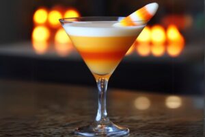 The Candy Corn Martini is a festive, sweet cocktail inspired by the iconic Halloween candy. With its bright orange hue and creamy texture, this dessert-like drink is perfect for Halloween parties and fall gatherings. The cocktail is infused with the flavors of vanilla, whipped cream, and a subtle hint of citrus, giving you a taste that’s both nostalgic and fun.