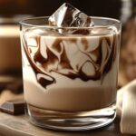 A decadent twist on the classic White Russian, this Chocolate White Russian adds rich, smooth chocolate flavors to the traditional combination of vodka, coffee liqueur, and cream. It’s perfect as an indulgent dessert drink or for any occasion when you want something sweet and satisfying.