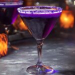 This spooky and vibrant Witches Brew Cocktail is the perfect drink for Halloween! It's a fun mix of fruity flavors with a hint of fizz, making it a hit at any party. The bold green color, achieved with Midori liqueur, and the eerie fog from dry ice make it look extra spooky and festive. It’s easy to make and can be served in a big cauldron or individual glasses.