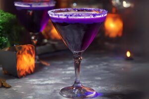 This spooky and vibrant Witches Brew Cocktail is the perfect drink for Halloween! It's a fun mix of fruity flavors with a hint of fizz, making it a hit at any party. The bold green color, achieved with Midori liqueur, and the eerie fog from dry ice make it look extra spooky and festive. It’s easy to make and can be served in a big cauldron or individual glasses.