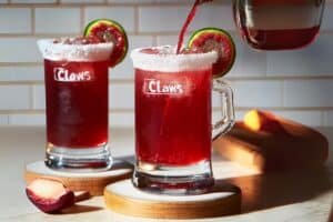 The Claws Cocktail is a bold and invigorating drink that balances tart fruit flavors with a kick of sharp liquor, making it perfect for a night out or a spooky gathering. Its dark and mysterious appearance gives off an edgy vibe, with a touch of sweetness and spice to keep things interesting.