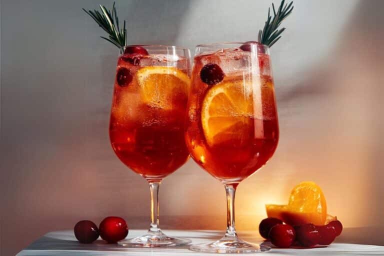 The Cranberry Aperol Spritz is a festive twist on the classic Italian cocktail, combining the bitter orange notes of Aperol with the tartness of cranberries for a perfect seasonal refreshment. This cocktail is ideal for holiday gatherings or whenever you're craving something light, bubbly, and refreshingly bitter-sweet.