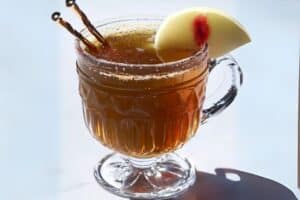 Wassail is a traditional hot cider-based punch, deeply rooted in Christmas and winter celebrations. It is warm, spiced, and perfect for cozying up by the fire or sharing at a holiday gathering. The blend of apple cider, citrus, and warming spices will fill your home with the comforting aroma of the season.