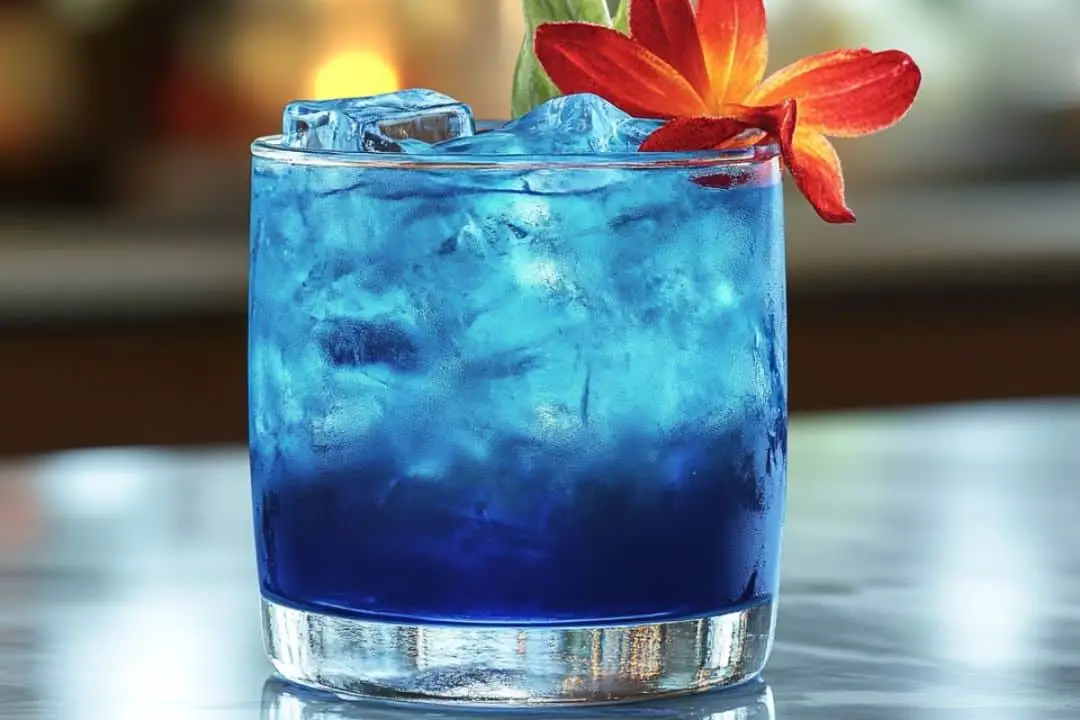 The Blue Flame Cocktail is a striking drink that combines vibrant blue liqueurs with a hint of citrus for a refreshing taste. This visually stunning cocktail features a dramatic blue hue and a flaming garnish that will captivate your guests and add an exciting twist to your gathering!