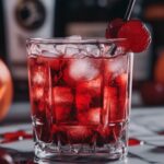 The Devil’s Smash is a bold and slightly spicy cocktail that combines the richness of bourbon with the tartness of blackberries and a subtle hint of spice. This deep red drink has an intense look and taste, perfect for fall gatherings or Halloween parties. The balance of fresh fruit and peppery notes make it a memorable cocktail with a devilishly delightful flavor.