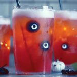 Halloween just got spookier with this fun and festive drink that kids, teens, and tweens will adore! Made with bright juices and topped with "creepy" gummy worms, these drinks are perfect for a Halloween party, family movie night, or just getting everyone in the holiday spirit.