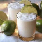 A tropical, creamy blend that's popular in Colombia, this drink combines the tartness of fresh lime juice with the rich smoothness of coconut cream. It's like a vacation in a glass, offering a perfect balance of citrus and coconut flavors with a luxuriously smooth texture.