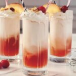 Indulge in a bubbly, creamy, and fruity treat with this homemade Italian Cream Soda recipe! With the perfect blend of sweet fruity syrup, fizzy club soda, and rich half-and-half, it's a fun and refreshing drink that’s perfect for any occasion. It’s simple to make and can be customized with your favorite fruity syrup!