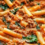 Creamy Sausage Rigatoni with Spinach, Garlic, and Tomato Cream Sauce