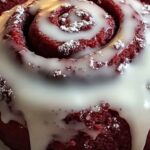 There’s something magical about red velvet and cinnamon rolls coming together in one delightful treat. These luscious, velvety rolls are soft, swirled with cinnamon and sugar, and topped with a rich cream cheese glaze. Perfect for breakfast, dessert, or any time you need a sweet indulgence!