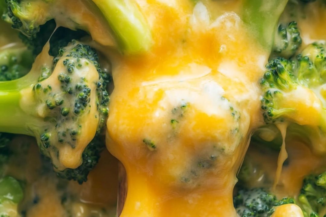 This Cheesy Broccoli dish is creamy, gooey, and packed with bold, comforting flavors that make it the perfect side dish or even a main course. Fresh broccoli florets are coated in a rich, cheesy sauce that is sure to please both kids and adults alike.