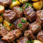 This Garlic Butter Steak Bites and Potatoes recipe brings the best of both worlds together. Tender steak bites, perfectly seared, are combined with crispy, golden potatoes, all coated in a rich garlic butter sauce. It's a hearty and flavorful dish that’s simple to make but will leave everyone craving more!