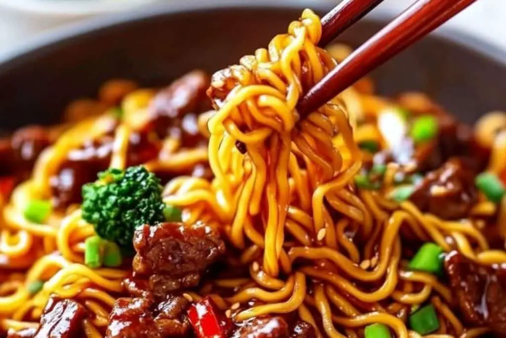 This Sticky Beef Noodles recipe is an irresistible combination of tender beef, flavorful sauce, and chewy noodles. The savory beef is coated in a rich, sticky sauce that clings to each noodle, making every bite a mouthwatering experience. Perfect for a quick weeknight meal or weekend treat