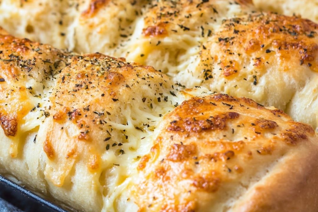 If you’ve ever had the pleasure of sinking your teeth into Subway's famous Italian Herb & Cheese Bread, you know it's a deliciously soft and savory experience. This copycat recipe gives you that same irresistible flavor, right from the comfort of your own kitchen. The combination of herbs and cheese baked right into the bread creates a soft, aromatic loaf that’s perfect for sandwiches, toast, or even on its own with a little butter.