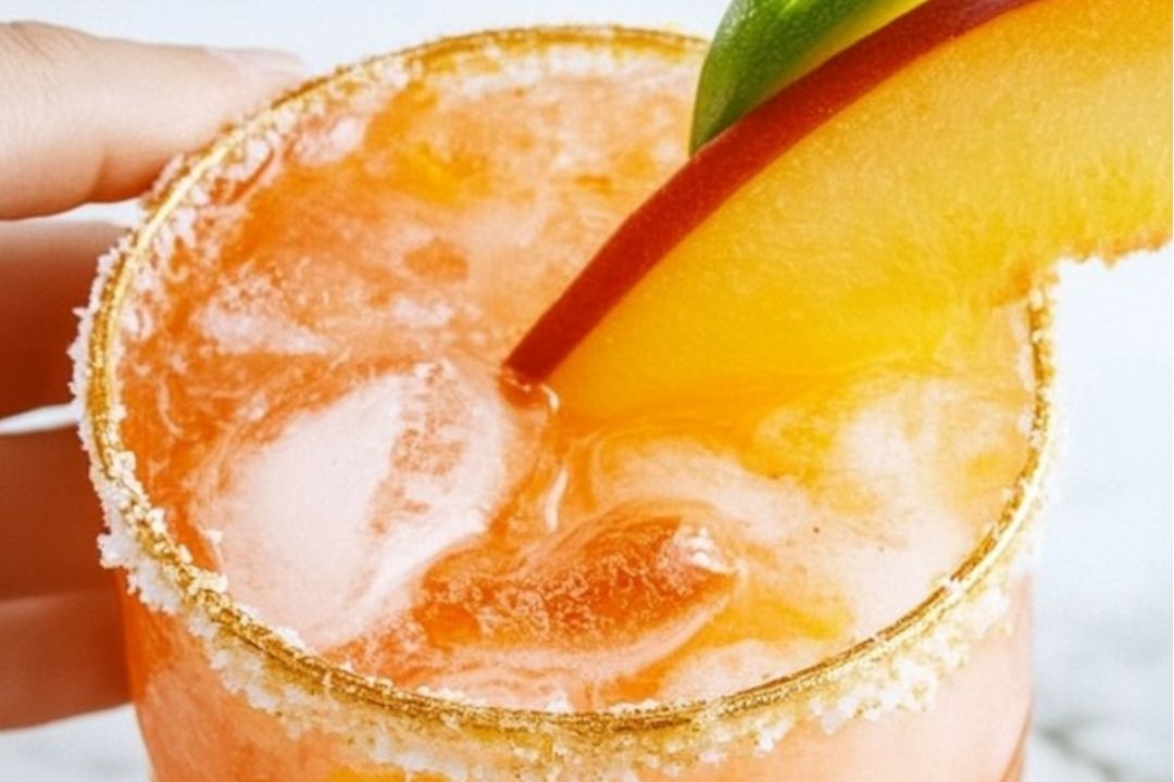 This Peach Margarita is the perfect mix of sweet, tangy, and refreshing with just the right amount of tequila kick. Made with only four simple ingredients, it’s an easy go-to for summer parties, backyard BBQs, or just a laid-back evening. No fancy syrups or complicated steps—just a smooth, fruity cocktail that tastes like sunshine in a glass.