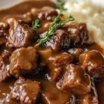 Crock Pot Beef Tips and Gravy is a cozy, flavorful dish that's perfect for any day of the week. With tender, melt-in-your-mouth beef tips cooked low and slow in a rich, savory gravy, this dish is both comforting and satisfying. Paired with mashed potatoes, rice, or even a side of crusty bread, it's a simple yet hearty meal that will become a family favorite.