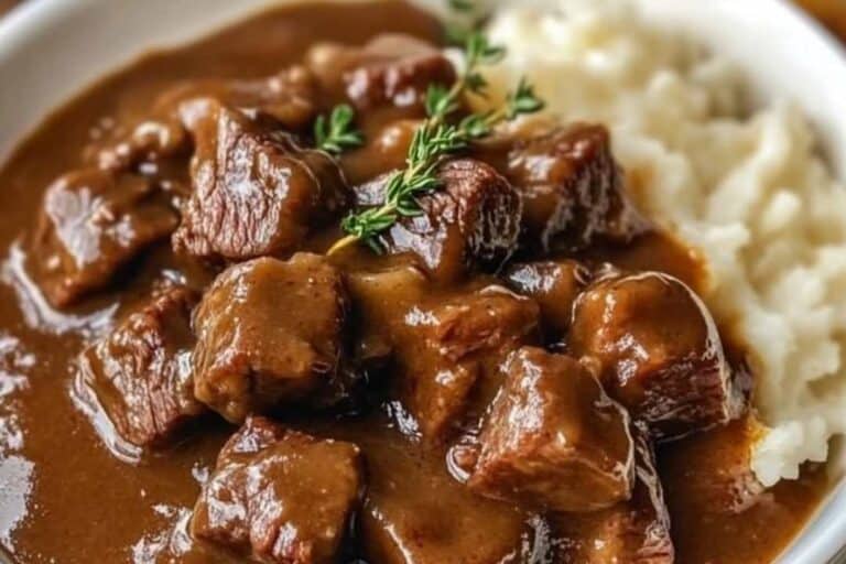 Crock Pot Beef Tips and Gravy is a cozy, flavorful dish that's perfect for any day of the week. With tender, melt-in-your-mouth beef tips cooked low and slow in a rich, savory gravy, this dish is both comforting and satisfying. Paired with mashed potatoes, rice, or even a side of crusty bread, it's a simple yet hearty meal that will become a family favorite.