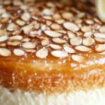 This German Bee Sting Cake, or Bienenstich Kuchen, is a delightful combination of fluffy yeast cake, creamy custard filling, and a crunchy almond topping. It's a timeless dessert that’s as much fun to make as it is to eat!