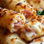 These crispy puff pastry ham and cheese sticks are the ultimate snack for any party or cozy evening at home. Quick to prepare with just a handful of ingredients, they’re always a crowd-pleaser. With their golden, flaky crust and savory filling of ham and melted cheese, these sticks are simply irresistible!