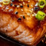 This baked teriyaki salmon is a perfect blend of sweet and savory flavors, all wrapped up in a tender, flaky fish. With minimal prep and a homemade teriyaki glaze, this dish is ideal for weeknight dinners or impressing guests without much effort.