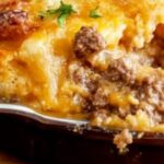 Cheddar Bay Ground Beef Cobbler is a comforting, savory dish that combines seasoned ground beef with a cheesy, golden biscuit topping inspired by the famous Cheddar Bay biscuits. It’s a hearty, one-pan meal perfect for cozy dinners or entertaining guests. Packed with flavor and easy to make, it’s destined to become a family favorite.