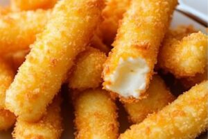 If you love spicy, cheesy goodness with a satisfying crunch, these Nashville Hot Mozzarella Sticks are going to be your new obsession. Coated in a fiery, crispy breading and fried until golden brown, they bring the heat and gooey cheese pull that’ll have everyone reaching for more. Perfect for game days, parties, or just a spicy snack craving!