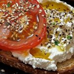 Ricotta-Topped Tomato Toast with Sesame and Olive Oil Bliss