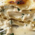 This Cheesy Chicken Alfredo Lasagna is the ultimate comfort meal. Layers of tender chicken, creamy Alfredo sauce, and gooey melted cheese come together in this rich and satisfying dish. Perfect for family dinners or a make-ahead meal, this lasagna is sure to be a favorite.