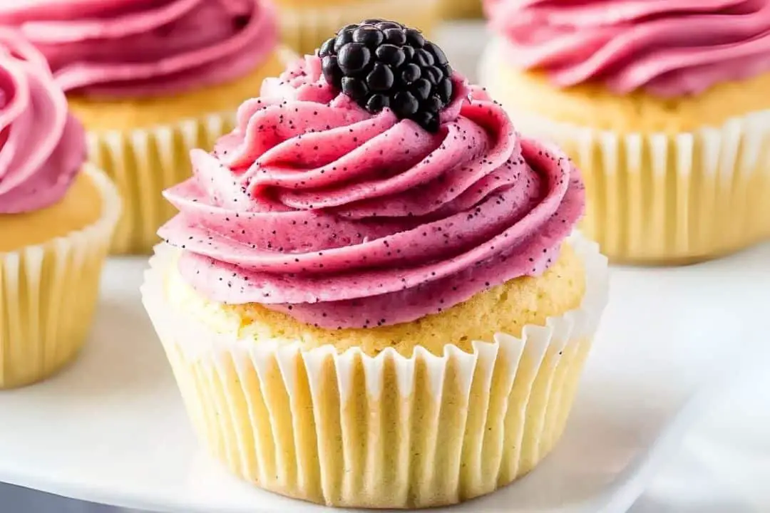 Lemon Poppy Seed Cupcakes with Blackberry Frosting