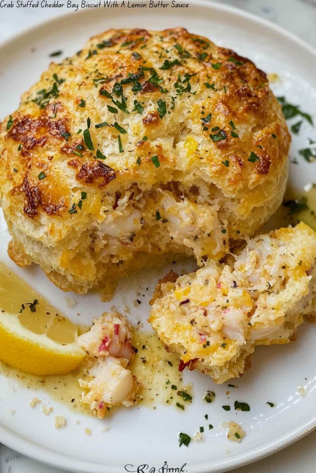 Crab Stuffed Cheddar Bay Biscuit With A Lemon Butter Sauce
