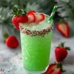 Grinch Punch with Green Hawaiian, Sherbet, and Strawberry Hearts Recipe