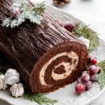 Chocolate Yule Log Cake with Sugared Cranberries and Rosemary Recipe